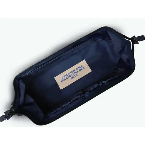 Trousse de toilette Cabaïa Rue Le Bastard blanc irisé